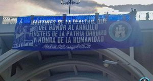 Pancarta de Hogar Social Madrid con motivo de la festividad del 2 de mayo